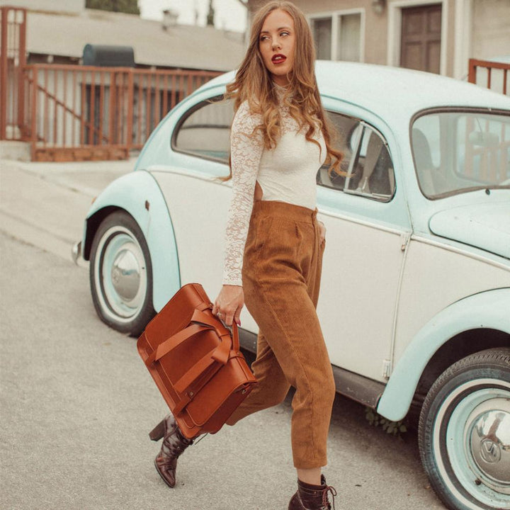 Vintage satchel with bow and kissing mouth